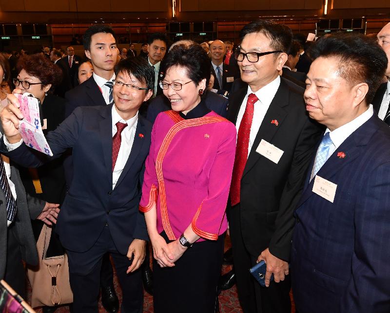 The Chief Executive, Mrs Carrie Lam (third right), is pictured with guests at a reception in celebration of the 69th anniversary of the founding of the People's Republic of China at the Grand Hall of the Hong Kong Convention and Exhibition Centre this morning (October 1).
