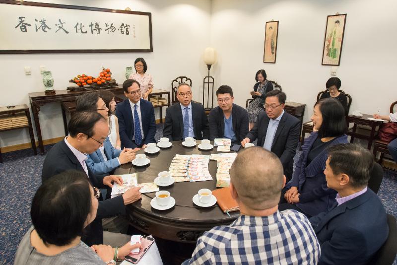 Members of the Legislative Council discuss with the Secretary for Home Affairs, Mr Lau Kwong-wah (sixth left), and the Director of Leisure and Cultural Services, Ms Michelle Li (third right), about the Government's work progress in the programming and audience building of public museums today (October 2). 