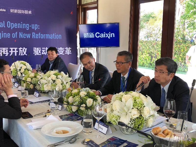 The Financial Secretary, Mr Paul Chan (second right), today (October 11) attends the Caixin Roundtable meeting in Bali, Indonesia. 