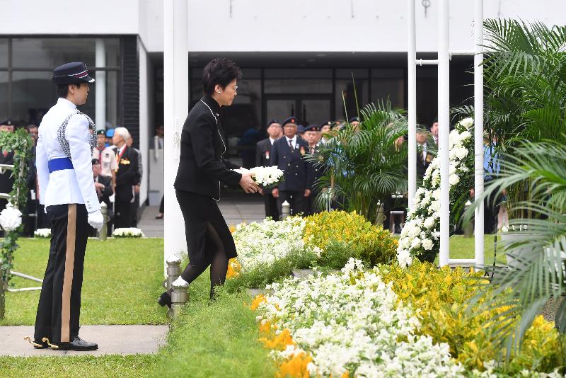 The Chief Executive, Mrs Carrie Lam, this morning (October 17) attended an official ceremony to commemorate those who died in the defence of Hong Kong between 1941 and 1945 at the Hong Kong City Hall Memorial Garden. Photo shows Mrs Lam (right) laying a wreath in front of the Memorial Shrine.