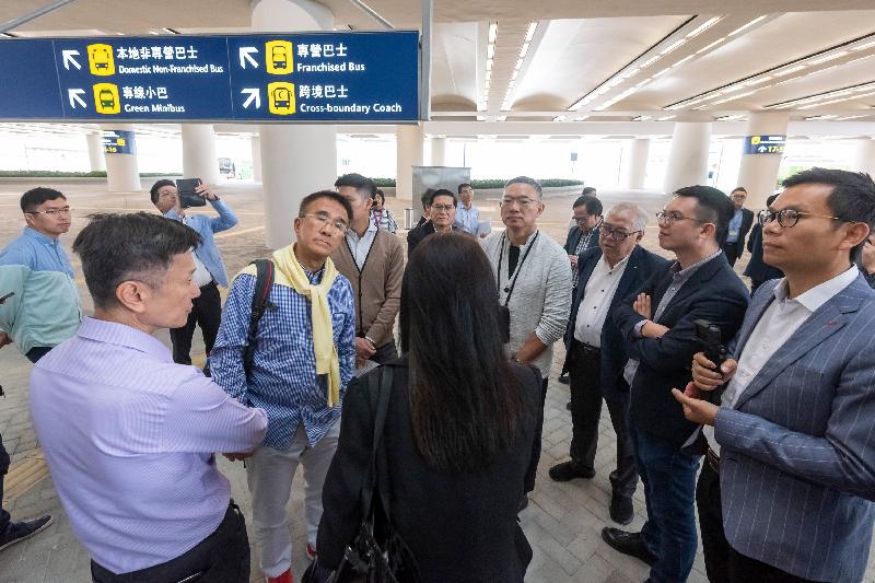 The Legislative Council Panel on Transport conducted a visit today (October 20) to the Hong Kong Port and the Hong Kong Link Road of the Hong Kong-Zhuhai-Macao Bridge. Photo shows Members visiting the public transport interchange.
