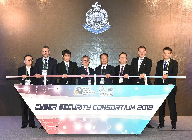 The Cyber Security Consortium 2018, organised by Hong Kong Police Force, opened at Police Headquarters today (October 23). Picture shows (from left) the Assistant Vice President (Engineering) of Hong Kong Telecom, Mr Wilfred Leung; the Managing Director, Global Security Sales Organization, Asia Pacific and Japan of CISCO Systems, Inc., Mr Stephen Dane; the Acting Director of Cybercrime Directorate, Executive Directorate of Police Services, INTERPOL, Mr Takayuki Oku; the Under Secretary for Innovation and Technology, Dr David Chung; the Acting Commissioner of Police, Mr Lau Yip-shing; the Government Chief Information Officer, Mr Victor Lam; the Chief of Security Insights & Global Threat Alliances Office of CISO, Fortinet, Mr Derek Manky; and the Vice-President, Threat Research, Kaspersky Lab, Mr Timur Biyachuev at the kick-off ceremony.