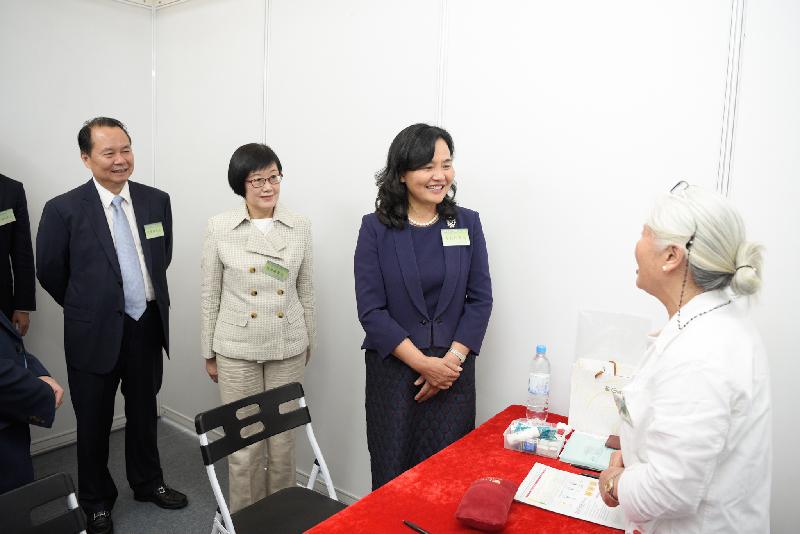 After the launch ceremony of Promotion of Traditional Chinese Medicine in China - Hong Kong Programme today (October 25), the officiating guests toured the booth of free medical consultation. Photo shows Member of the party group of National Health Commission and Party Secretary and Vice Commissioner of the National Administration of Traditional Chinese Medicine Professor Yu Yanhong (second right); the Director of Health, Dr Constance Chan (second left); and the Director of the Traditional Chinese Medicine Bureau of Guangdong Province, Mr Xu Qingfeng (first left).