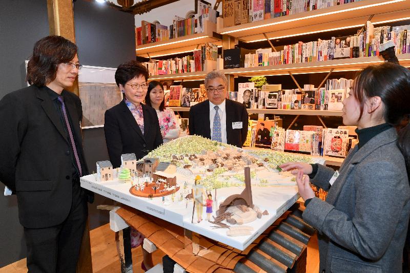 The Chief Executive, Mrs Carrie Lam, continued her visit to Japan in Tokyo today (October 31) and attended the Hong Kong Institute of Architects Tokyo Exhibition "More than High-rise: Exploring Hong Kong through Architecture". Photo shows Mrs Lam (second left), accompanied by  Project Leader of the Exhibition and Immediate Past President of HKIA, Mr Vincent Ng (first left) touring the exhibition.
