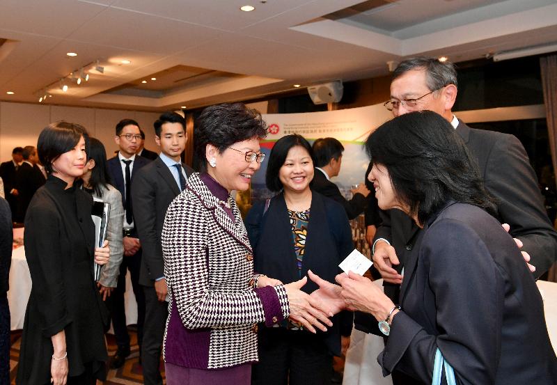 The Chief Executive, Mrs Carrie Lam, continued her visit to Japan in Tokyo today (October 31) and attended "Asian Youth Orchestra (AYO) Alumni Special Concert – Celebrating Friendship between Japan and Hong Kong" presented by more than 20 alumni of the AYO from Hong Kong and Japan in the evening. Photo shows Mrs Lam (centre) chatting with guests during the pre-concert cocktail reception.

