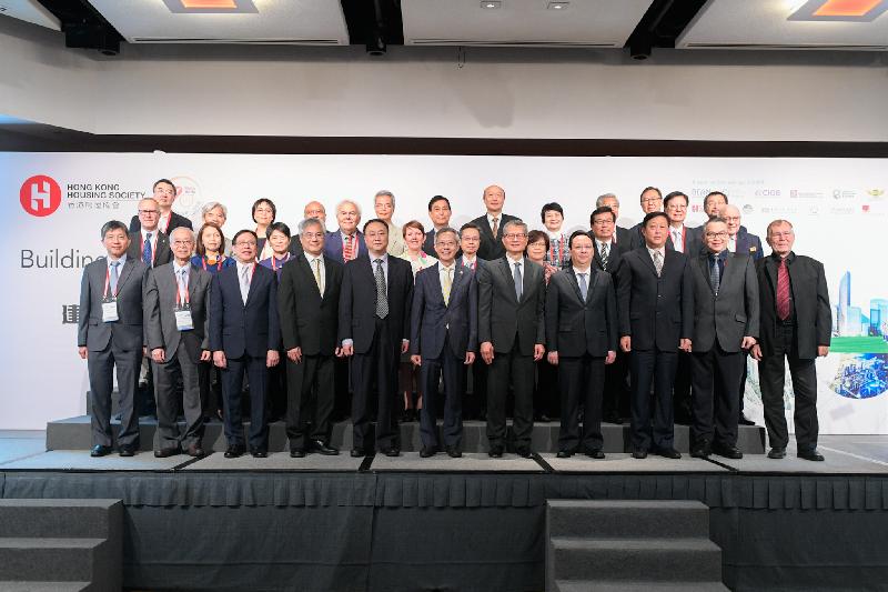 The Financial Secretary, Mr Paul Chan, attended the HKHS International Housing Conference 2018, which is themed on "Building a Smart and Liveable City for an Ageing Community", this morning (November 2). Photo shows Mr Chan (front row, fifth right); Deputy Director of the Liaison Office of the Central People's Government in the Hong Kong Special Administrative Region Mr Tan Tieniu (front row, fourth right); the Chairman of the Hong Kong Housing Society, Mr Walter Chan (front row, sixth right); and other guests at the conference. 