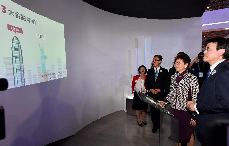 The Chief Executive, Mrs Carrie Lam, toured the China International Import Expo in Shanghai this afternoon (November 5). Photo shows Mrs Lam (second right); the Secretary for Commerce and Economic Development, Mr Edward Yau (first right); and the Secretary for Constitutional and Mainland Affairs, Mr Patrick Nip (second left) , viewing the 3D mapping at the Hong Kong Exhibition Area.