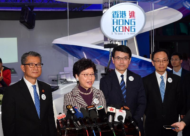 The Chief Executive, Mrs Carrie Lam (second left), and the Secretary for Commerce and Economic Development, Mr Edward Yau (second right), meet the media in Shanghai this afternoon (November 5). Looking on are the Financial Secretary, Mr Paul Chan (first left), and the Secretary for Constitutional and Mainland Affairs, Mr Patrick Nip (first right).