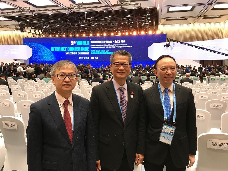 The Financial Secretary, Mr Paul Chan, today (November 7) joined the 5th World Internet Conference in Wuzhen. Photo shows Mr Chan (centre); the Under Secretary for Innovation and Technology, Dr David Chung (left); and the Government Chief Information Officer, Mr Victor Lam (right), at the conference.