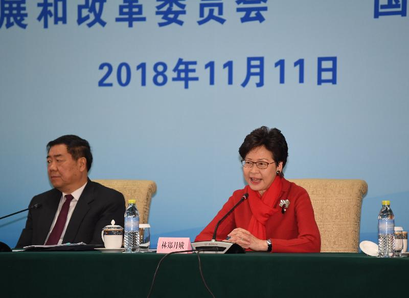 The Chief Executive, Mrs Carrie Lam, today (November 11), leading a delegation to Beijing in celebration of the 40th anniversary of the country's reform and opening up, attended the seminar on the participation of Hong Kong and Macao in the reform and opening up of the country in the past 40 years co-organised by the National Development and Reform Commission and the Hong Kong and Macao Affairs Office of the State Council at the Diaoyutai State Guesthouse.  Photo shows Mrs Lam (right) giving opening remarks at the seminar. Also pictured is the Chairman of the National Development and Reform Commission, Mr He Lifeng.