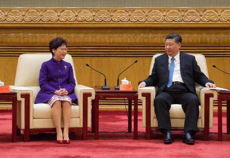 President Xi Jinping (right) met with the delegation led by the Chief Executive, Mrs Carrie Lam, in celebration of the 40th anniversary of the reform and opening up of the country in Beijing today (November 12). Photo shows Mrs Lam (left) speaking at the meeting.