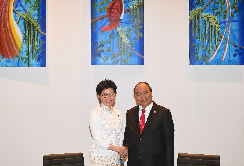 The Chief Executive, Mrs Carrie Lam, meets with the Prime Minister of Vietnam, Mr Nguyen Xuan Phuc, in Port Moresby, Papua New Guinea today (November 18). Photo shows Mrs Lam (left) shaking hands with Mr Nguyen (right) before the meeting.