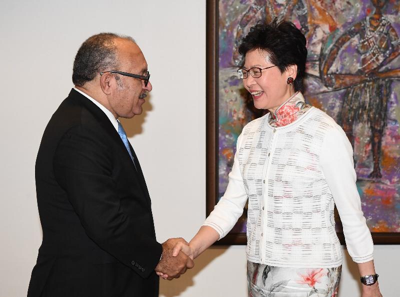 The Chief Executive, Mrs Carrie Lam, met with the Prime Minister of Papua New Guinea, Mr Peter O'Neill, in Port Moresby, Papua New Guinea today (November 19). Photo shows Mrs Lam (right) shaking hands with Mr O'Neill before the meeting.