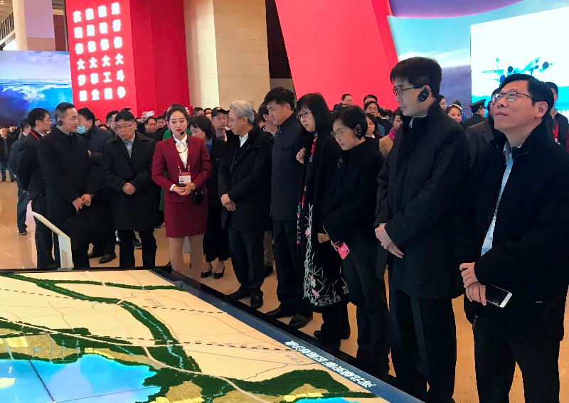 The Secretary for the Civil Service, Mr Joshua Law, is leading a delegation of 11 Permanent Secretaries and Heads of Department of the Hong Kong Special Administrative Region Government for a national studies course and visit programme in Beijing. Photo shows Mr Law (sixth right) and delegation members touring a major exhibition commemorating the 40th anniversary of China's reform and opening-up at the National Museum today (November 20).