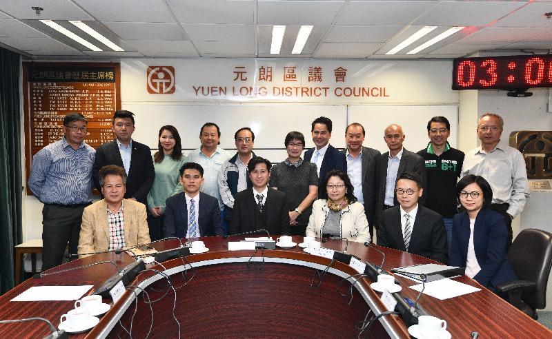 The Secretary for Justice, Ms Teresa Cheng, SC (front row, third right), visits Yuen Long District today (November 23) and meets with members of the Yuen Long District Council to exchange views on issues of concern.