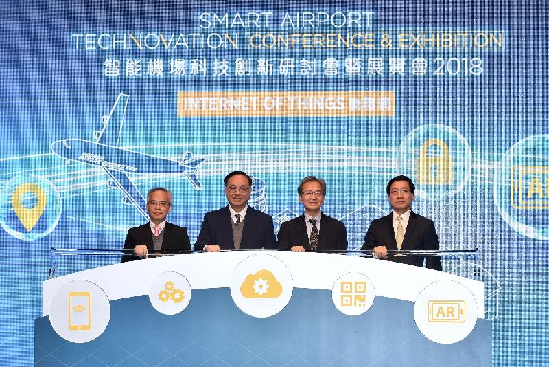 The Secretary for Innovation and Technology, Mr Nicholas W Yang (second left); the Chairman of the Airport Authority Hong Kong (AA), Mr Jack So (second right); the Chief Executive Officer of the AA, Mr Fred Lam (first right); and the Under Secretary for Transport and Housing, Dr Raymond So Wai-man (first left), officiate at the opening ceremony of the Smart Airport - Technovation Conference and Exhibition 2018 today (November 28).