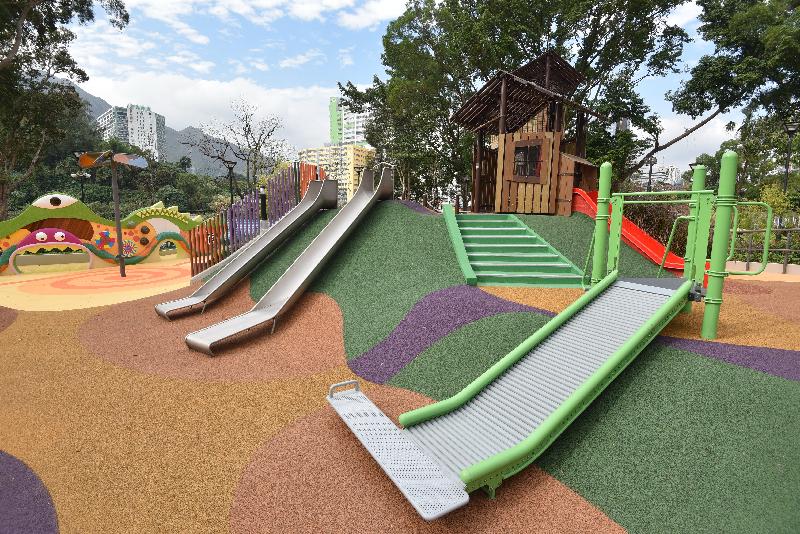 The inclusive playground in Tuen Mun Park will be opened for public use on December 3. Photo shows various types of slides for the enjoyment of children with different physical abilities. Adjacent to the slides is a colourful sensory wall which gives stimuli to children's senses.