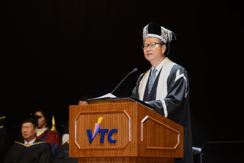 The Financial Secretary, Mr Paul Chan, speaks at the Vocational Training Council graduation ceremony this afternoon (December 4).