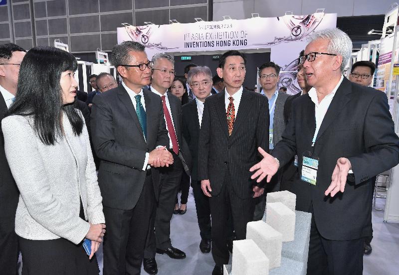 The Financial Secretary, Mr Paul Chan, attended the Opening Ceremony of the Hong Kong Trade Development Council (HKTDC) SmartBiz Expo and Asian E-tailing Summit this morning (December 5). Photo shows Mr Chan (second left) accompanied by the Executive Director of the HKTDC, Ms Margaret Fong (first left), touring an Expo booth.