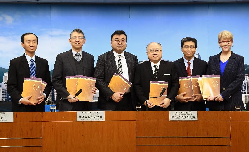 The Chairman of the Archives Law Sub-committee of the Law Reform Commission (LRC), Mr Andrew Liao, SC (third right); members of the Sub-committee Mr Michael Chan (second right), Mrs Stacy Lee (first right); and Mr Richard Khaw, SC (third left); the Secretary of the LRC, Mr Peter Wong (second left); and the Secretary of the Sub-committee, Mr Byron Leung (first left), attend a press conference today (December 6) to release the consultation paper on archives law.