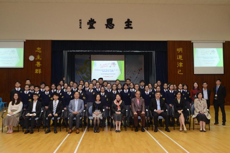 The Secretary for Justice, Ms Teresa Cheng, SC, visited Carmel Divine Grace Foundation Secondary School today (December 7). Photo shows Ms Cheng (front row, fifth right) with the Chairman of the Sai Kung District Council, Mr George Ng (front row, fourth right), and the District Officer (Sai Kung), Mr David Chiu (front row, third right), as well as teachers and students.