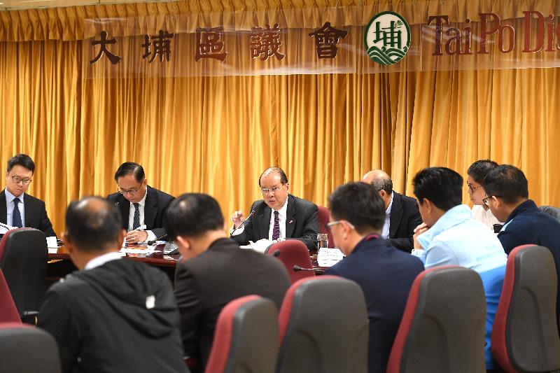 The Chief Secretary for Administration, Mr Matthew Cheung Kin-chung (third left), joined by the Secretary for Innovation and Technology, Mr Nicholas W Yang (second left), today (December 7) visit Tai Po District and meet with members of the Tai Po District Council.