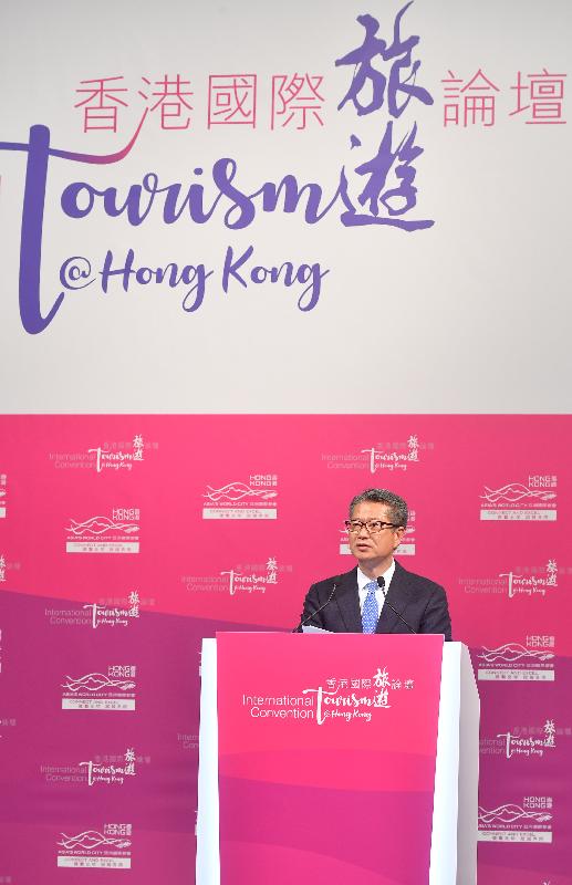 The Financial Secretary, Mr Paul Chan, speaks at the keynote luncheon of the Hong Kong International Tourism Convention today (December 12). 