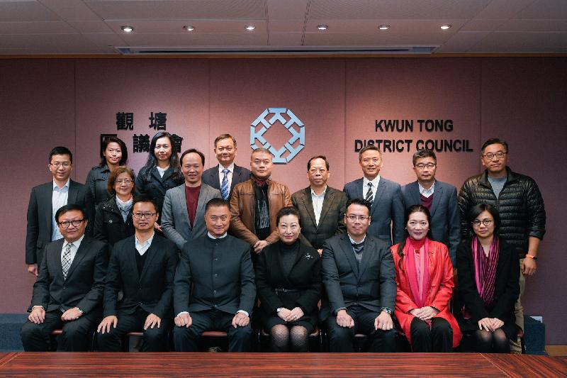 The Secretary for Justice, Ms Teresa Cheng, SC (front row, centre), visits Kwun Tong District today (December 13) and meets with members of the Kwun Tong District Council to exchange views on issues of concern.
