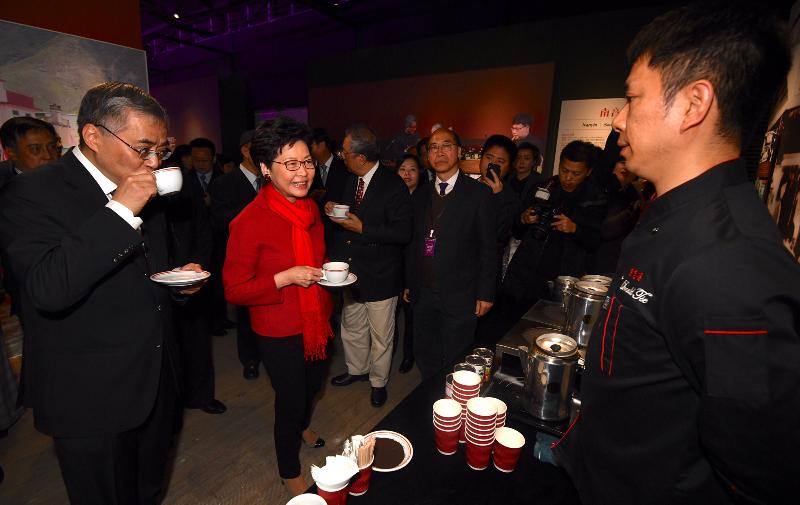 The Chief Executive, Mrs Carrie Lam, attended the Opening Ceremony of the Exhibition Month of "The Oral Legacies: Intangible Cultural Heritage of the Hong Kong Special Administrative Region" of the 2018 Activity Series of the National Intangible Cultural Heritage Exhibition and Protection Base at Prince Kung's Mansion Museum of the Ministry of Culture and Tourism in Beijing today (December 15). Photo shows Mrs Lam (second left) tasting Hong Kong-style milk tea.