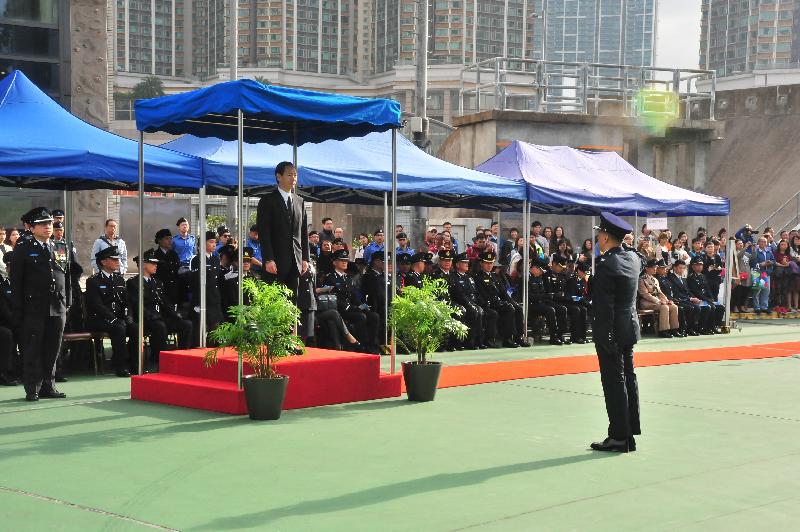 The Civil Aid Service (CAS) held the 79th Recruits Passing-out Parade at its headquarters today (December 16).  Photo shows the Convenor of the Non-official Members of the Executive Council, Mr Bernard Chan, taking the salute from the parade.