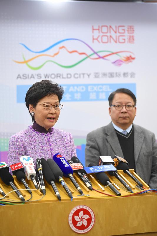 The Chief Executive, Mrs Carrie Lam (left), meets the media in Beijing this afternoon (December 17) to conclude her visit to Beijing. Also joining is the Director of the Chief Executive's Office, Mr Chan Kwok-ki.