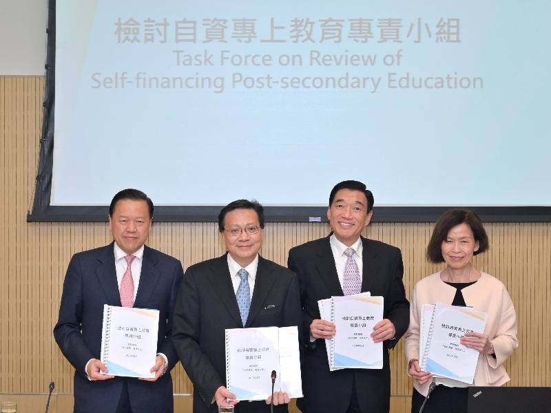 The Chairman of the Task Force on Review of Self-financing Post-secondary Education, Professor Anthony Cheung (second left), briefed the media on the review report released by the Task Force today (December 27). He is pictured with Task Force members Mr Tim Lui (first left), Mr Henry Fan (second right) and Professor Julia Tao (first right).

