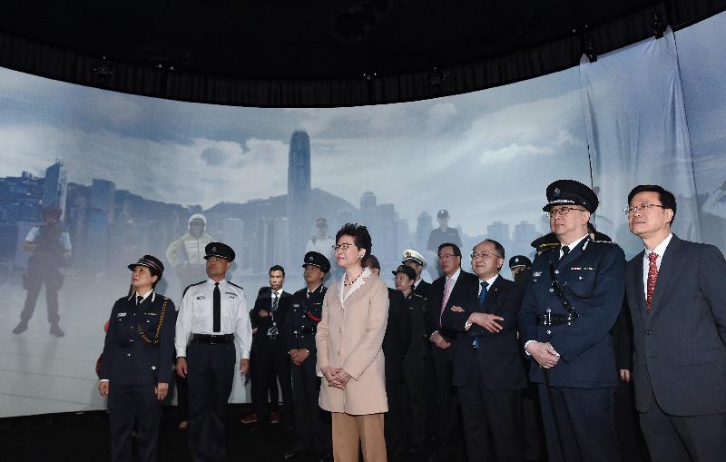 The Hong Kong Police Force today (January 12) held the opening ceremony of the “Hong Kong Police Force 175th Anniversary Open Day” at the Hong Kong Police College. The Chief Executive, Mrs Carrie Lam (centre); the Secretary for Security, Mr John Lee (first right); the Commissioner of Police, Mr Lo Wai-chung (second right); the Director of the Liaison Office of the Central People's Government in the Hong Kong Special Administrative Region, Mr Wang Zhimin (third right); and the President of the Legislative Council, Mr Andrew Leung (fourth right), are watching a video about the history of Hong Kong and the Force at “Studio ImmerXe”.
