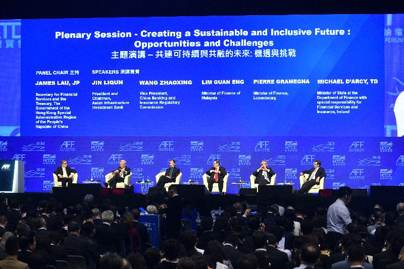 The Secretary for Financial Services and the Treasury, Mr James Lau, attended the plenary session on "Creating a Sustainable and Inclusive Future: Opportunities and Challenges" at the 12th Asian Financial Forum this morning (January 14). Photo shows Mr Lau (first left) chairing the plenary session at the Forum and exchanging views with the President and Chairman of the Asian Infrastructure Investment Bank, Mr Jin Liqun (second left); the Vice President of the China Banking and Insurance Regulatory Commission, Mr Wang Zhaoxing (third left); the Minister of Finance of Malaysia, Mr Lim Guan Eng (third right); the Minister of Finance of Luxembourg, Mr Pierre Gramegna (second right); and the Minister of State at the Department of Finance with special responsibility for Financial Services and Insurance of Ireland, Mr Michael D’Arcy (first right).