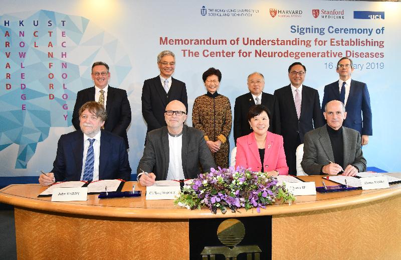 The Chief Executive, Mrs Carrie Lam, attended the signing ceremony of the Memorandum of Understanding for Establishing The Center for Neurodegenerative Diseases today (January 16). The centre is to be established by the Hong Kong University of Science and Technology (HKUST), Harvard Medical School, Stanford University School of Medicine and University College London. Photo shows Mrs Lam (back row, third left); the Secretary for Innovation and Technology, Mr Nicholas W Yang (back row, second right); the Chairman of the Council of HKUST, Mr Andrew Liao (back row, third right); the President of HKUST, Professor Shyy Wei (back row, second left); the British Consul General to Hong Kong and Macao, Mr Andrew Heyn (back row, first left); and the Acting Consul General of the United States to Hong Kong and Macau, Mr Thomas Hodges (back row, first right), witnessing representatives signing the Memorandum of Understanding.
