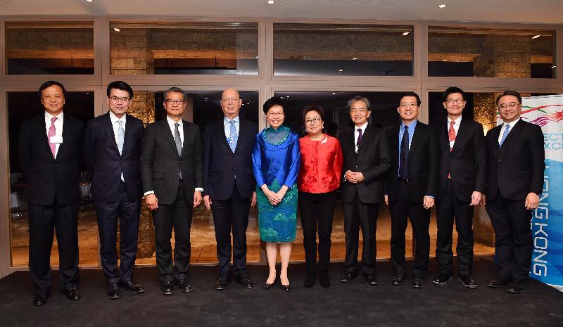 The Chief Executive, Mrs Carrie Lam, attended the World Economic Forum Annual Meeting in Davos, Switzerland yesterday (January 24, Davos time). Photo shows (from left) the Chief Executive of Hong Kong Exchanges and Clearing Limited (HKEX), Mr Charles Li;  the Secretary for Commerce and Economic Development, Mr Edward Yau; the Financial Secretary, Mr Paul Chan; the Founder and Executive Chairman of the World Economic Forum, Professor Klaus Schwab; Mrs Lam; the Chairman of HKEX, Mrs Laura M Cha; the Chairman of the Airport Authority Hong Kong (AA), Mr Jack So; the Chief Executive Officer of the AA, Mr Fred Lam; the Chief Executive Officer of the MTR Corporation Limited (MTRCL), Mr Lincoln Leong; and the Managing Director - Operations and Mainland Business of the MTRCL, Dr Jacob Kam, at the Hong Kong Night co-organised by the Hong Kong Special Administrative Region Government and the Hong Kong Exchanges and Clearing Limited.
