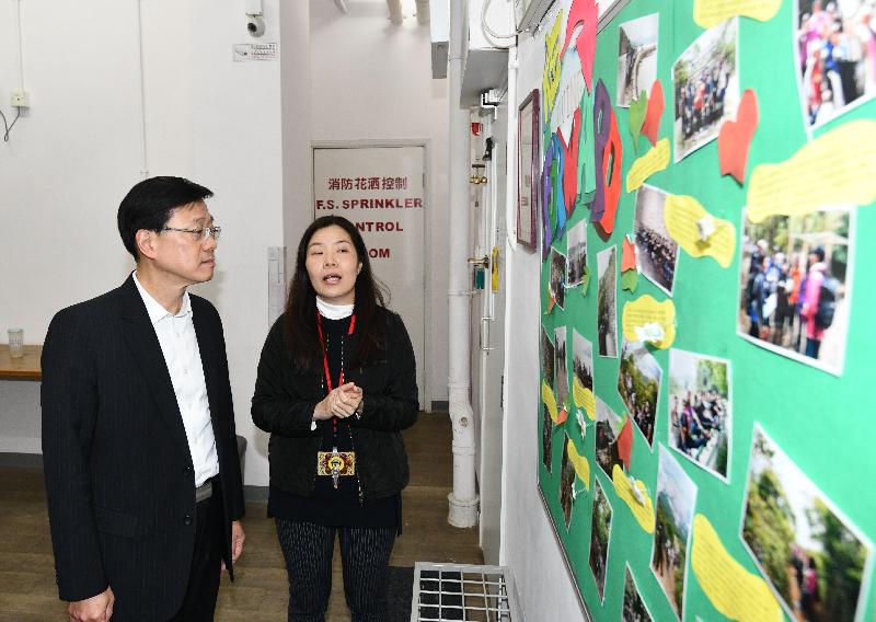 The Secretary for Security, Mr John Lee (left), is briefed on the services of the Adult Female Rehabilitation Centre of the Society for the Aid and Rehabilitation of Drug Abusers during his visit to Sha Tin this afternoon (January 25).