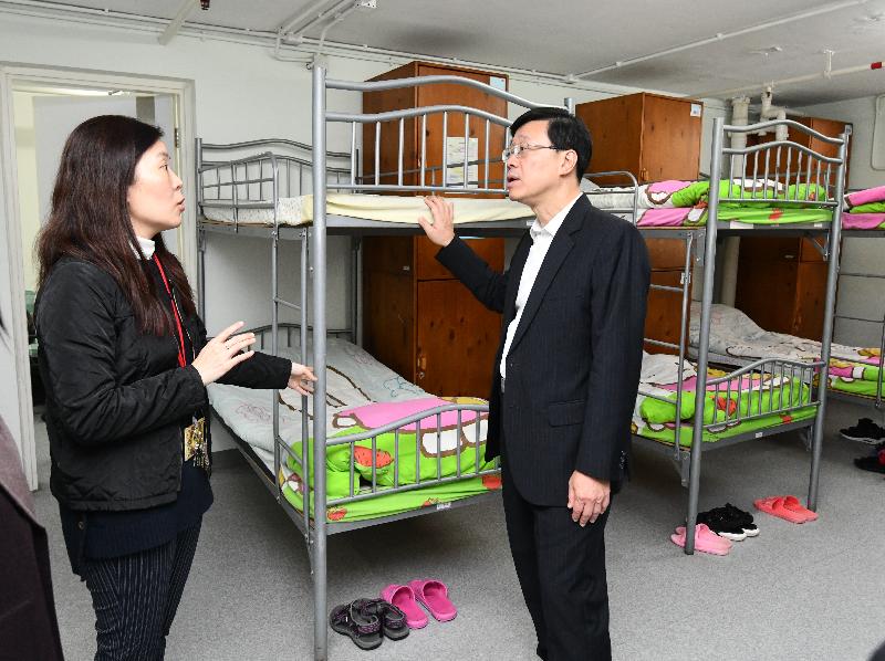The Secretary for Security, Mr John Lee (right), tours the facilities of the Adult Female Rehabilitation Centre of the Society for the Aid and Rehabilitation of Drug Abusers during his visit to Sha Tin this afternoon (January 25). 