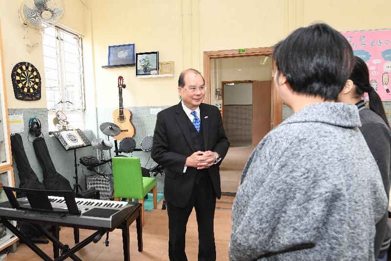 The Chief Secretary for Administration, Mr Matthew Cheung Kin-chung, today (January 28) visited the Marycove School co-located with the Marycove Center of the Sisters of the Good Shepherd. Photo shows Mr Cheung (first left) receiving a briefing from the Center's Superintendent, Ms Eliza Poon (second right), and a student on the school's facilities.