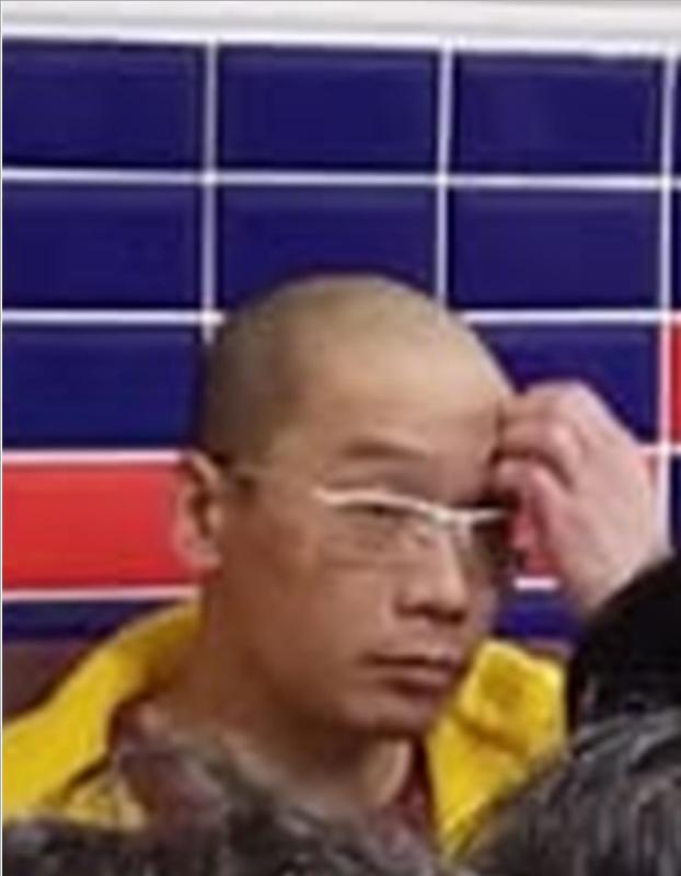 Lee Yiu-ming, aged 47, is about 1.65 metres tall, 55 kilograms in weight and of thin build. He has a round face with yellow complexion and is bald. He was last seen wearing a pair of white-rimmed glasses.