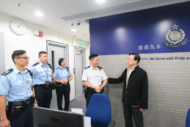  The Secretary for Security, Mr John Lee, visited West Kowloon Station (WKS) of the Hong Kong Section of the Guangzhou-Shenzhen-Hong Kong Express Rail Link today (February 5) to see its operation on Lunar New Year’s Day and meet personnel on duty at the WKS Port. Photo shows Mr Lee (first right) visiting the Police Report Centre at the Hong Kong Port Area.