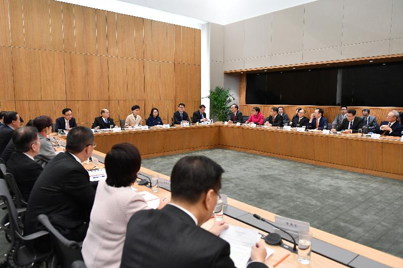 The Chief Executive, Mrs Carrie Lam (third left), holds an engagement session with about 30 Hong Kong deputies to the National People's Congress at the Chief Executive's Office today (February 12).