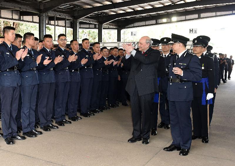 The Chairman of the Independent Police Complaints Council, Dr Anthony Francis Neoh (second right), accompanied by the Commissioner of Police, Mr Lo Wai-chung (first right), meets graduates after the passing-out parade held at the Hong Kong Police College today (February 16).
