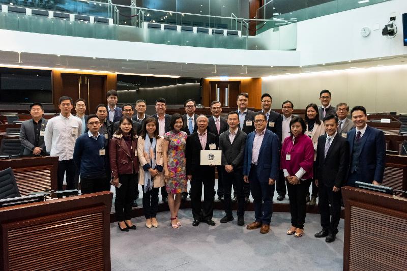 Members of the Legislative Council (LegCo) held a meeting today (February 19) with members of the Sha Tin District Council (DC). Photo shows LegCo Members and DC members in a group photo at the LegCo Complex.