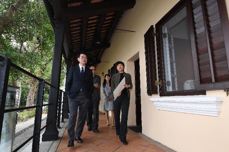 The Secretary for Commerce and Economic Development, Mr Edward Yau (first left), tours the Green Hub during his visit to Tai Po District today (February 21). He was briefed by representatives of the Green Hub's education programmes on their promotional work on environmental protection in the community.