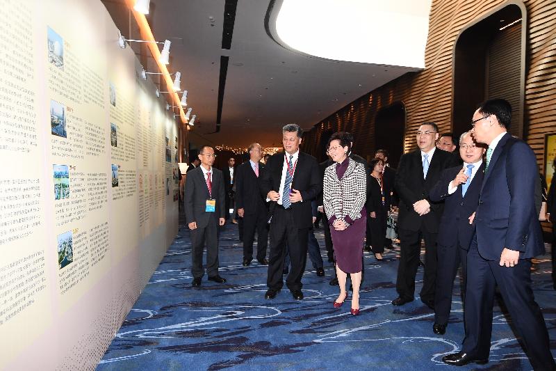 The Chief Executive, Mrs Carrie Lam, attended the Symposium on the Outline Development Plan for the Guangdong-Hong Kong-Macao Greater Bay Area today (February 21). Photo shows Mrs Lam (fourth right); the Governor of Guangdong Province, Mr Ma Xingrui (fifth right); the Chief Executive of the Macao Special Administrative Region, Mr Chui Sai-on (third right); the Director of the Liaison Office of the Central People's Government in the Hong Kong Special Administrative Region, Mr Wang Zhimin (second right); and the Secretary for Constitutional and Mainland Affairs, Mr Patrick Nip (first right), viewing the display panels on the development of the Guangdong-Hong Kong-Macao Greater Bay Area.
