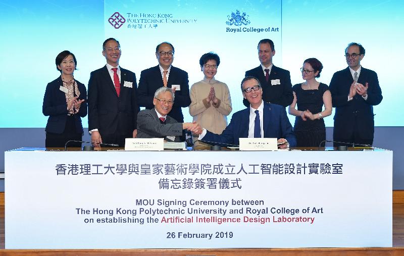The Chief Executive, Mrs Carrie Lam, attended the Memorandum of Understanding Signing Ceremony between the Hong Kong Polytechnic University (PolyU) and the Royal College of Art (RCA) on establishing the Artificial Intelligence Design Laboratory today (February 26). Photo shows Mrs Lam (back row, centre); the Council Chairman of PolyU, Dr Lam Tai-fai (back row, third left); the Executive Vice President of PolyU, Dr Miranda Lou (back row, first left); the Vice President (Research Development) of PolyU, Professor Alexander Wai (back row, second left), witnessing the signing by the Interim President of PolyU, Professor Philip Chan (front row, left), and the Vice-Chancellor of the RCA, Dr Paul Thompson (front row, right).