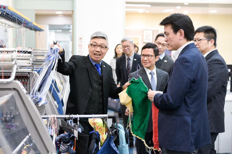 The Secretary for Commerce and Economic Development, Mr Edward Yau (front right), visited the Pro-Act Training and Development Centre (Fashion Textiles), a member institution of the Vocational Training Council, during his visit to Kwai Tsing District today (March 11). He toured workshops on woven and knitted fabric as well as fabric inspection to get to know some of the latest technologies in the industry.
