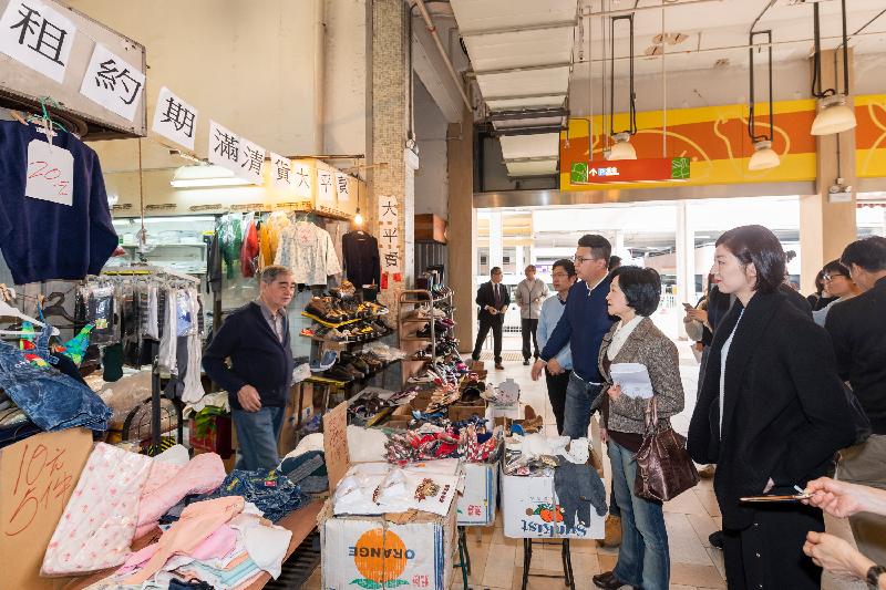 Members of the Legislative Council (LegCo) conduct a site visit to various retail and carparking facilities of public housing estates in Sham Shui Po, Tsuen Wan and Tuen Mun today (March 13). Photo shows LegCo Members visiting Lai Kok Shopping Centre in Sham Shui Po.