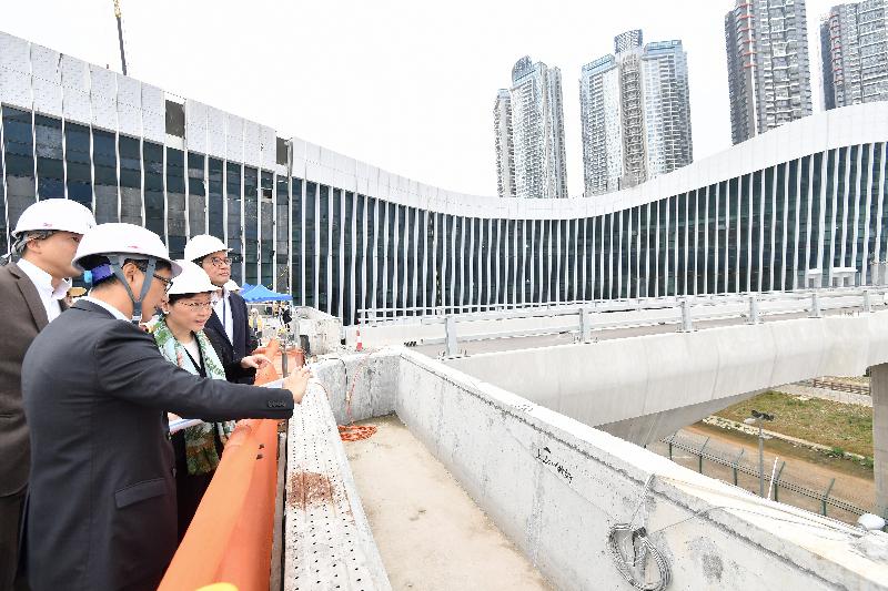 The Chief Executive, Mrs Carrie Lam (third left), accompanied by the Secretary for Development, Mr Michael Wong (fourth left) and the Under Secretary for Security, Mr Sonny Au, inspected the Liantang/Heung Yuen Wai Boundary Control Point (BCP) project today (March 14) to learn about the latest situation of the cross-boundary infrastructure project. Photo shows Mrs Lam inspecting the Passenger Terminal Building of the new BCP and being briefed by the Director of Civil Engineering and Development, Mr Ricky Lau (second left).
